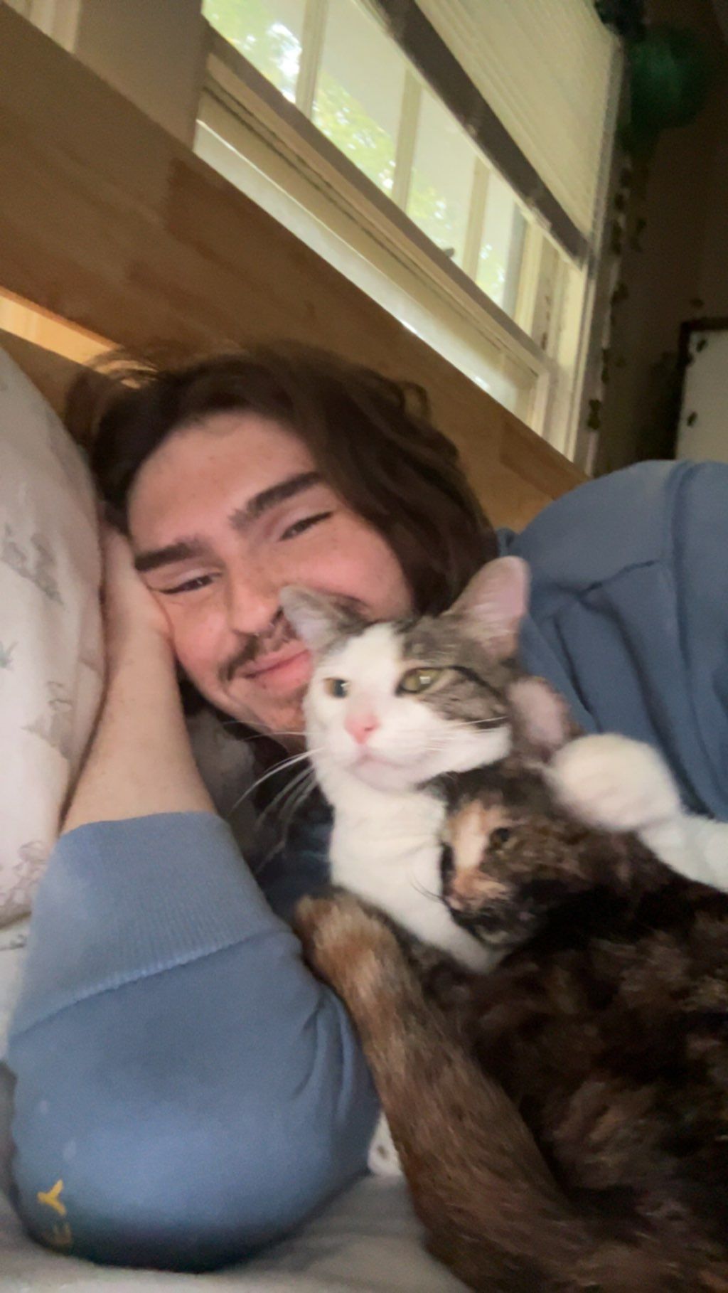 mine and my roommates kitties cuddling. 