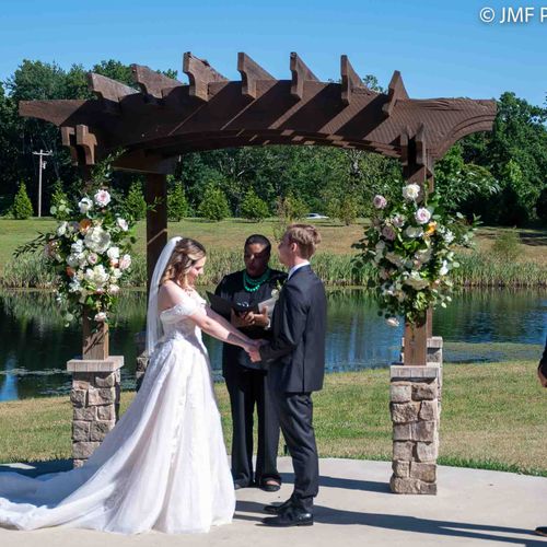 Bride and groom at the alter at Homestead Manor in