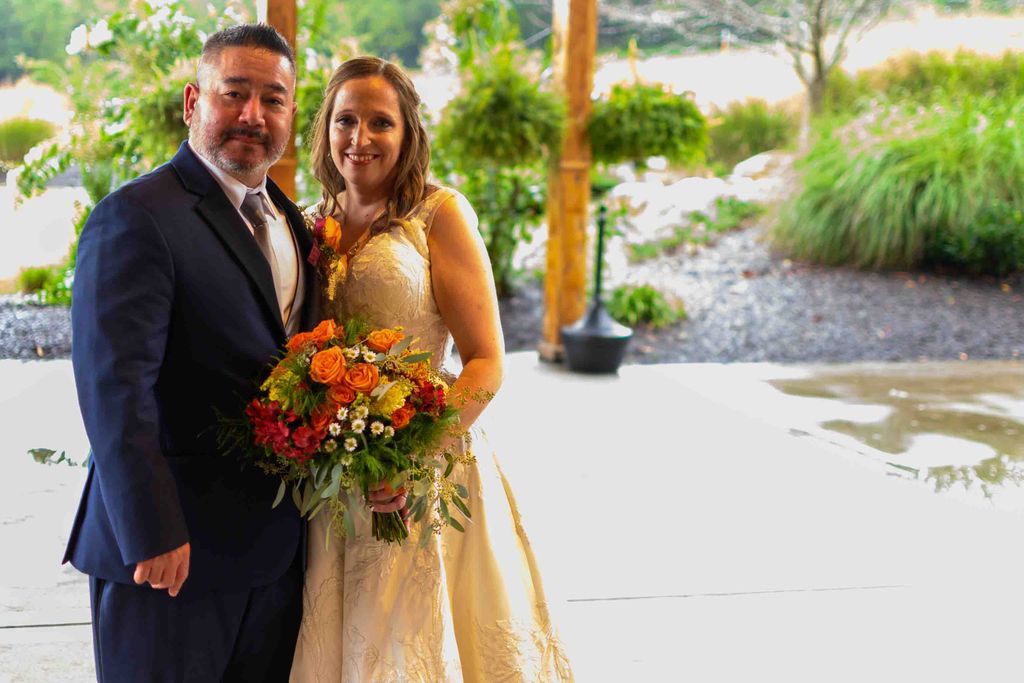 Bride and Groom posing at The Barn at Fiddle Dee F