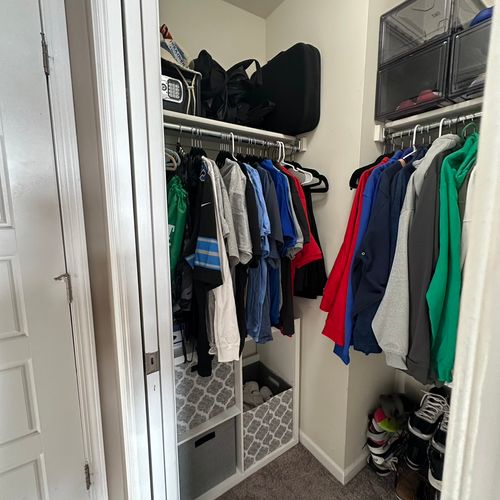 Kid's room closet: after! The laundry hamper seems