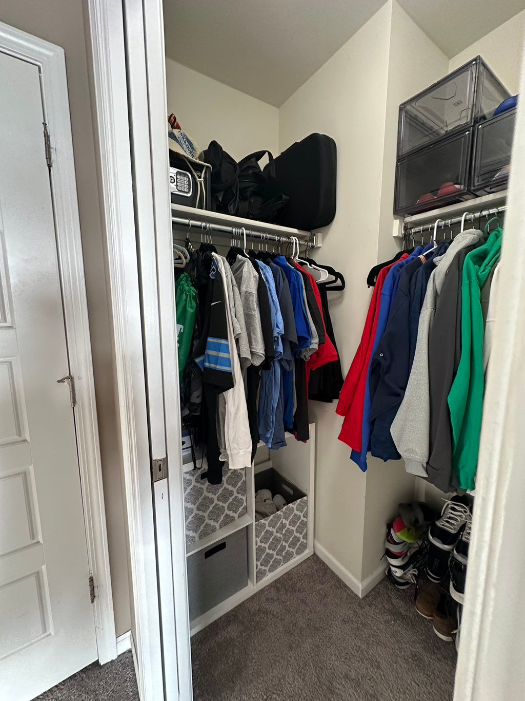 Kid's room closet: after! The laundry hamper seems