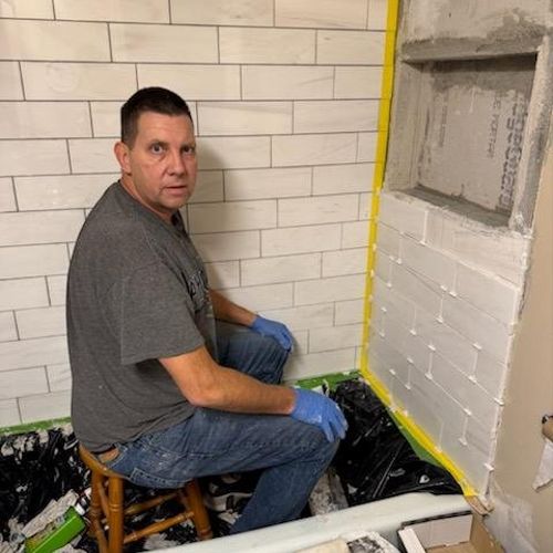 Brian painted our kitchen cabinets, installed kitc