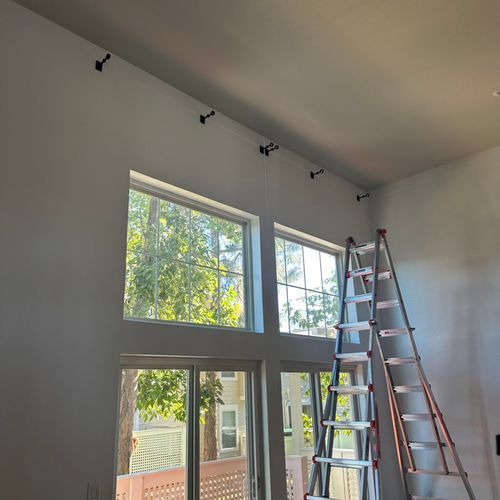 Double curtain rod install with 15’ ceilings. 