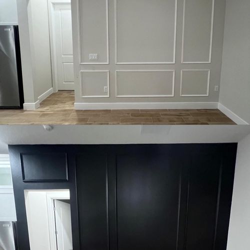 I made the wooden boiserie and painted it black