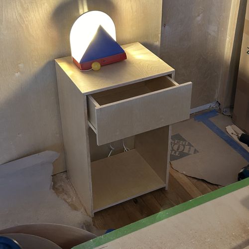 Closeup of nightstand with custom sliding drawer 