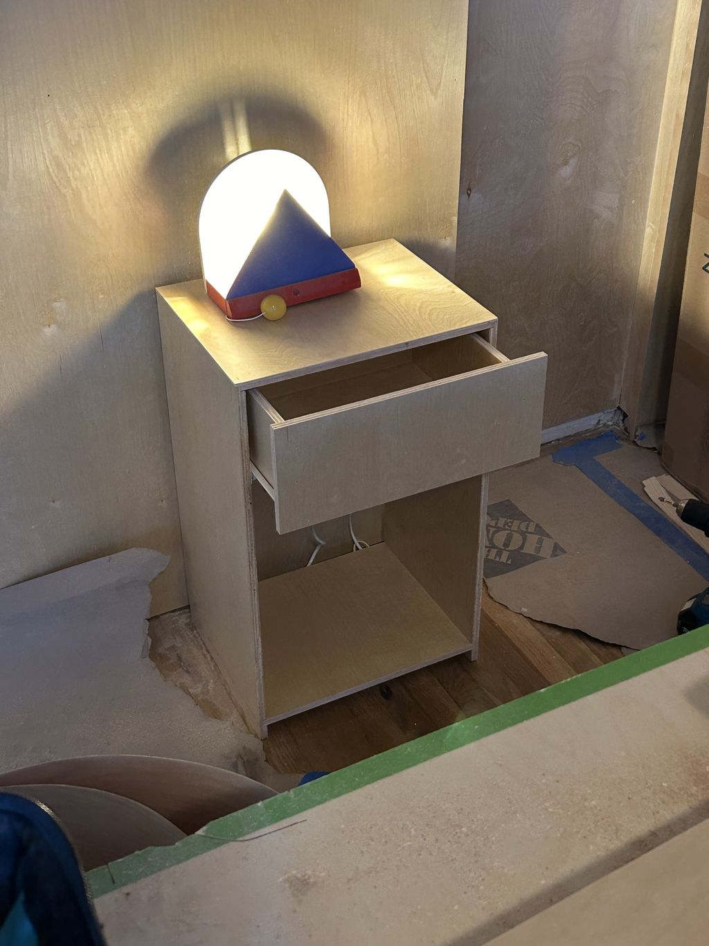 Closeup of nightstand with custom sliding drawer 