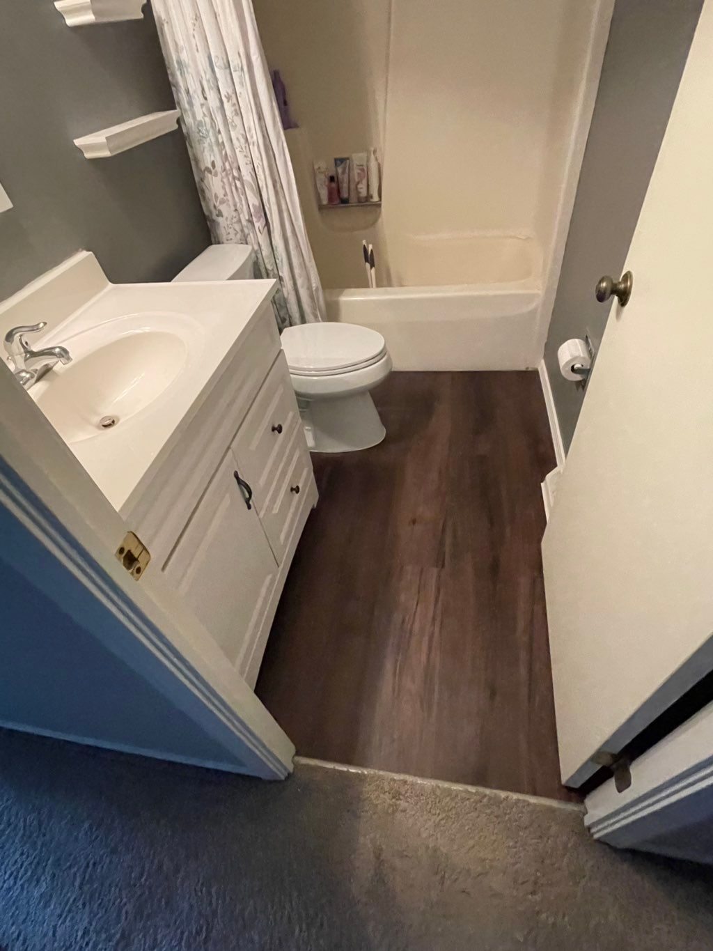 After: new LVP, New Toilet, new baseboards.. 