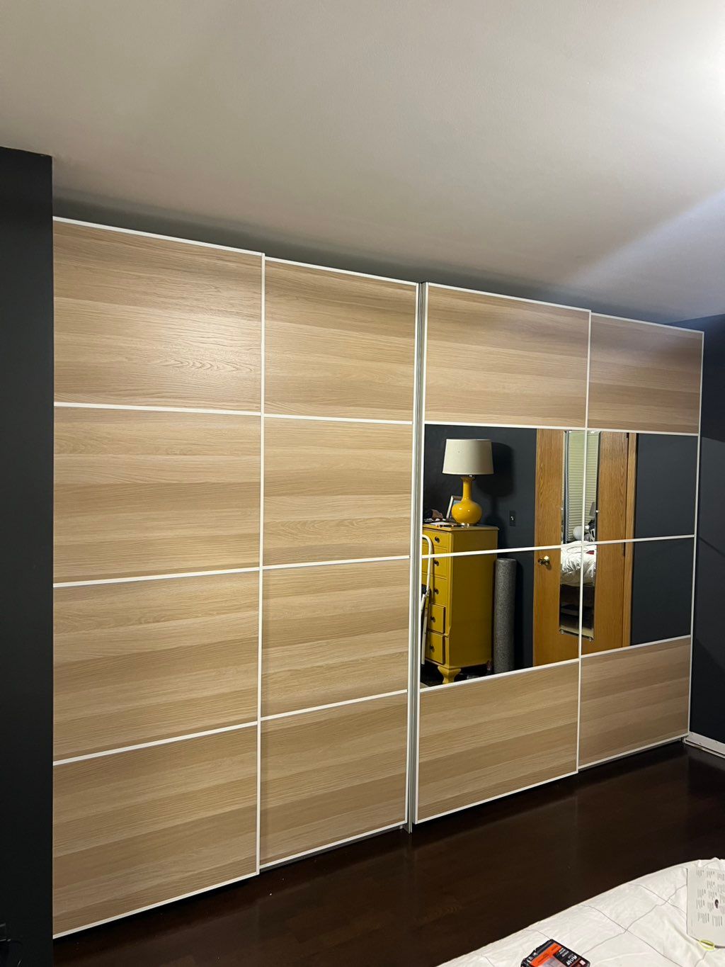 Assembling a bedroom wardrobe.
