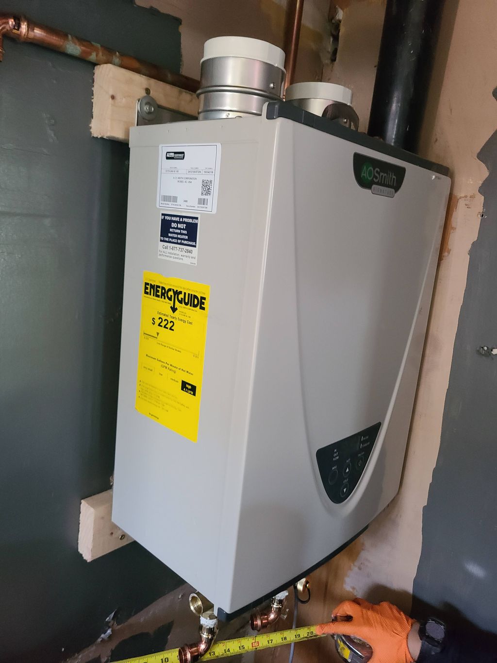 installing a new tankless water heater AOS Smith