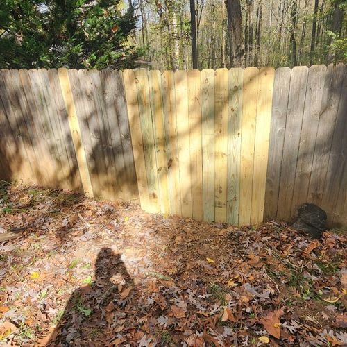 Hired price t services to repair a privacy fence w