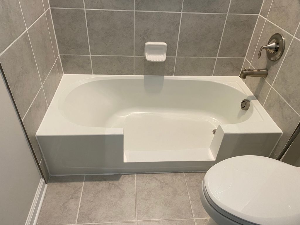 Tub to shower conversion