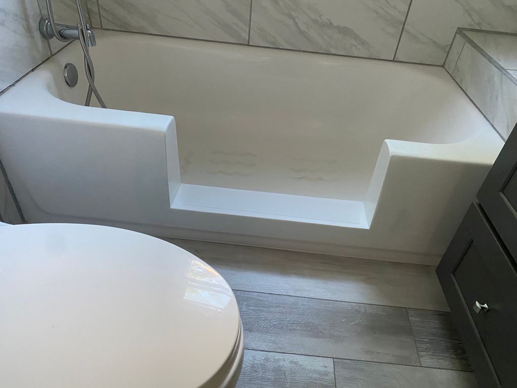 Tub to shower conversion