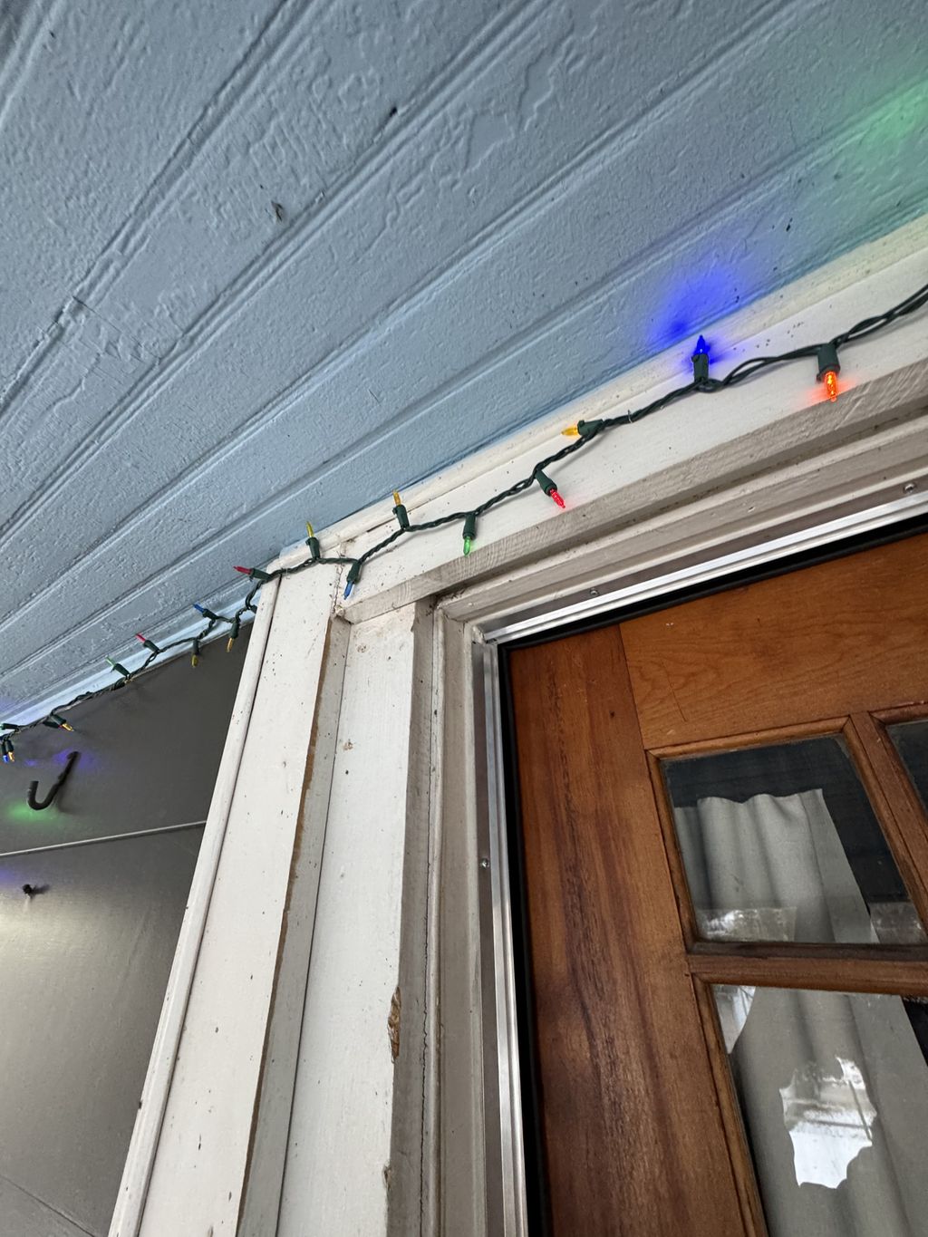 Removed and installed new door weather stripping -
