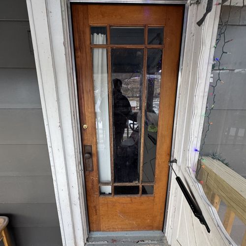 Removed and installed new door weather stripping -