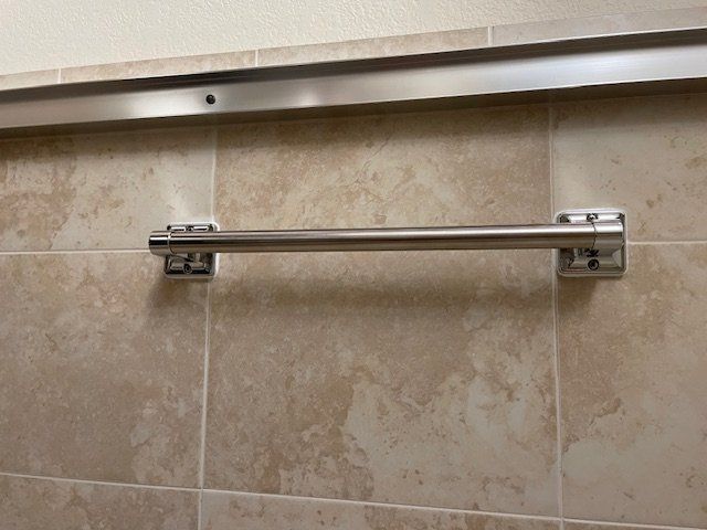 Pasha installed shower grab bars for me.  Did a ve