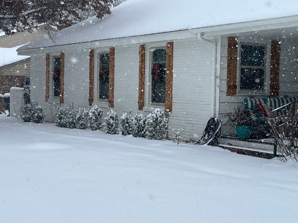 Snowy pic of the home.  Painted the exterior and b