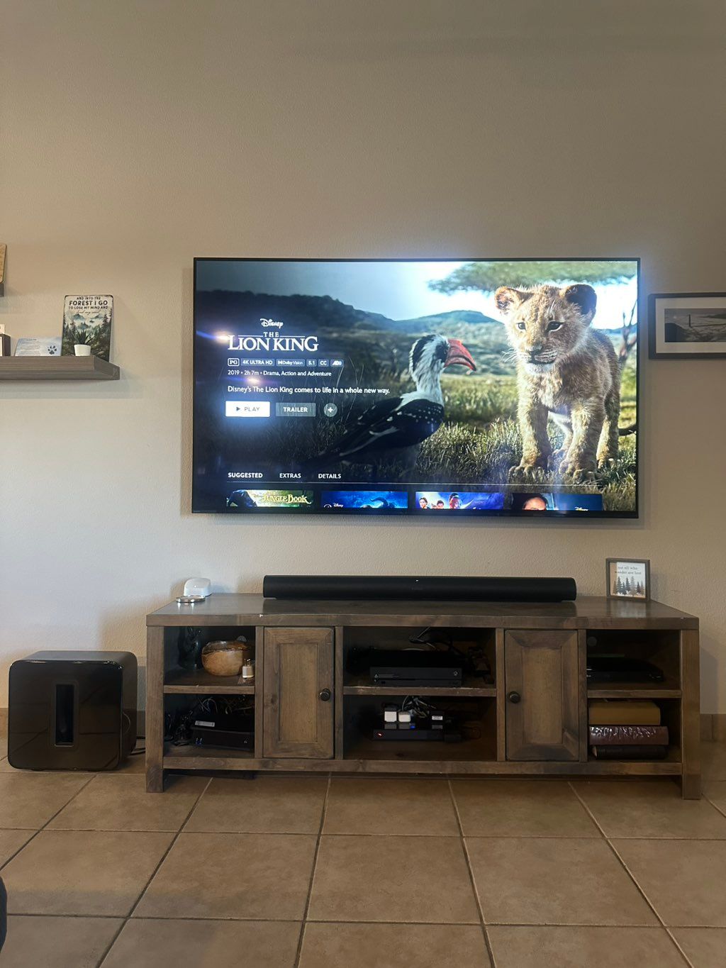 SONY Bravia 77” with a inwall power kit to hide th