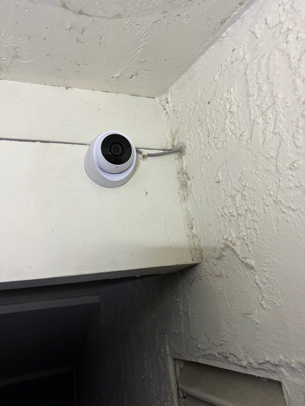 Security camera installed to monitor the entrance 