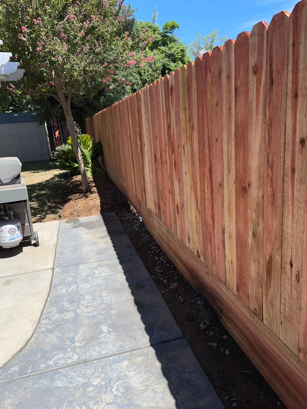 Redwood fence installed 