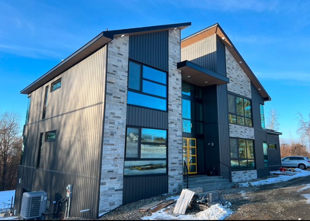 New Siding/Stone/Window Caps/Soffit & Fascia