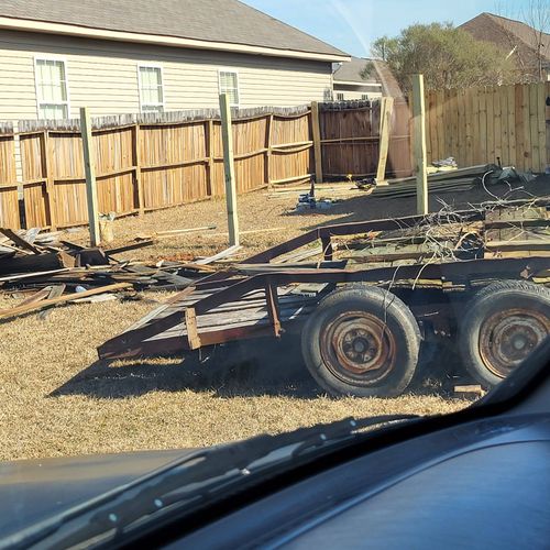 removing old fence and adding new wood fence