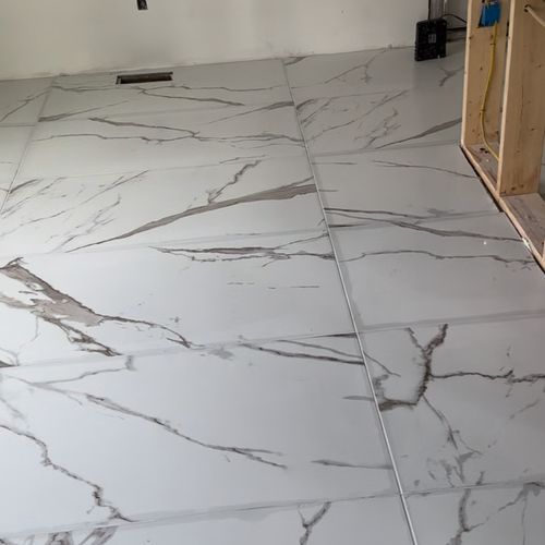 Beautifully laid out marble flooring. 