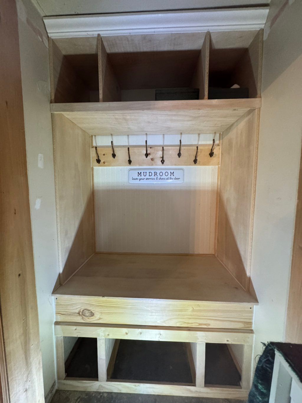 Closet transformed into a mudroom 