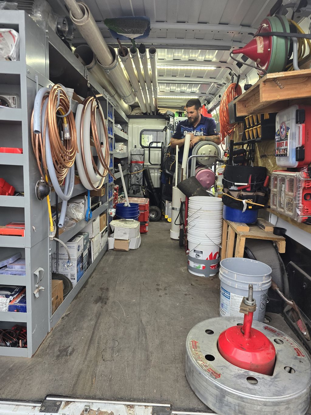 Keven loading up materials in the van 