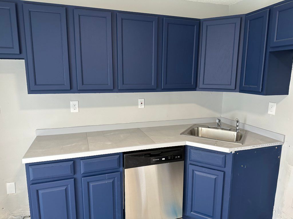 Installed polished porcelain counter top. New sink