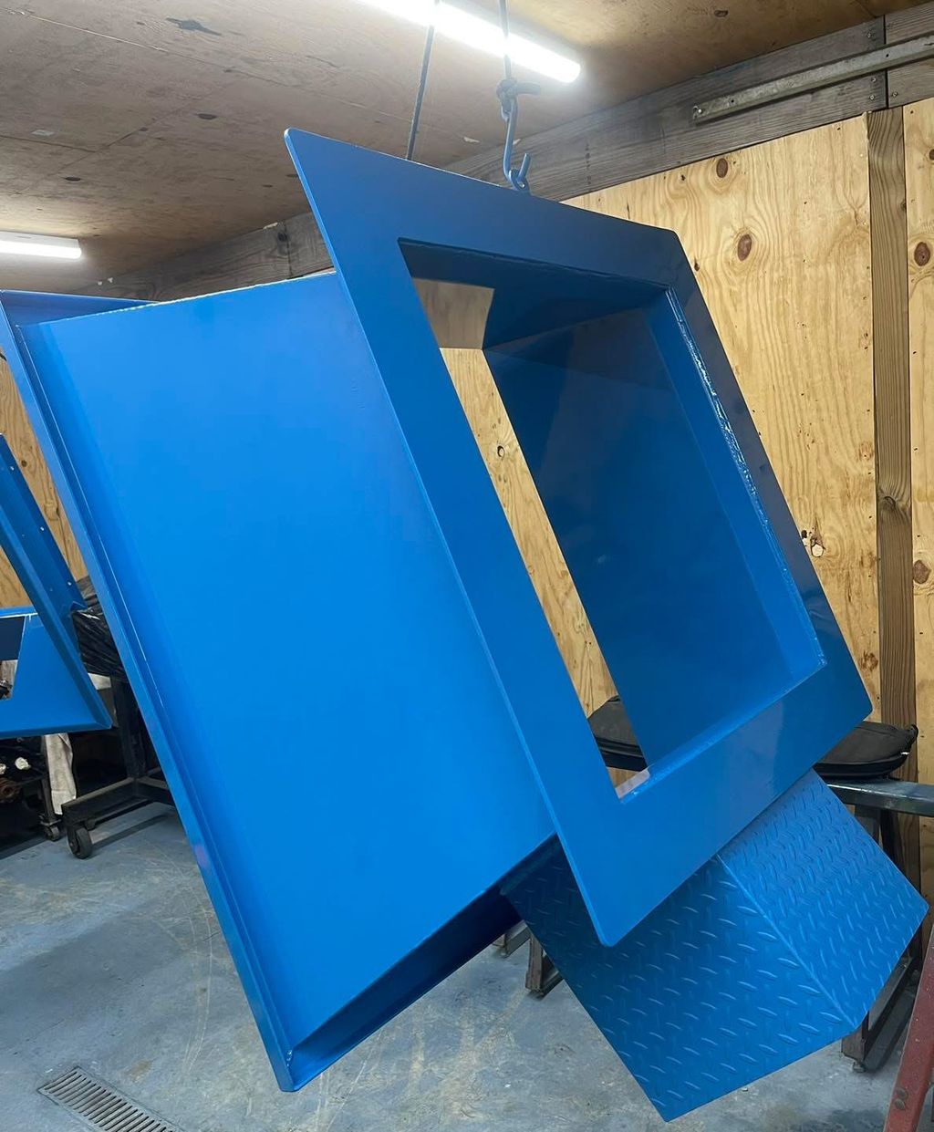 Custom agricultural spreader hopper
