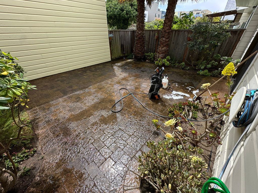 Power wash on pavers 