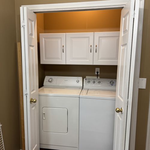 installed cabinet boxes from lowes in laundry clos