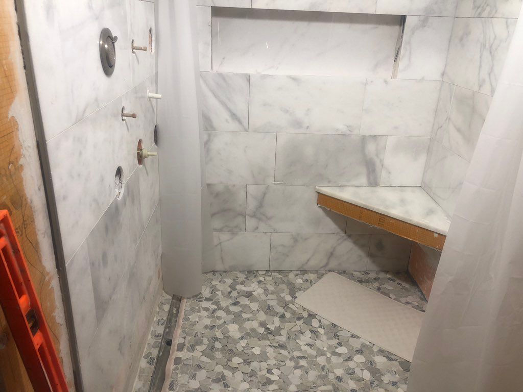 Installing and tiling shower bench