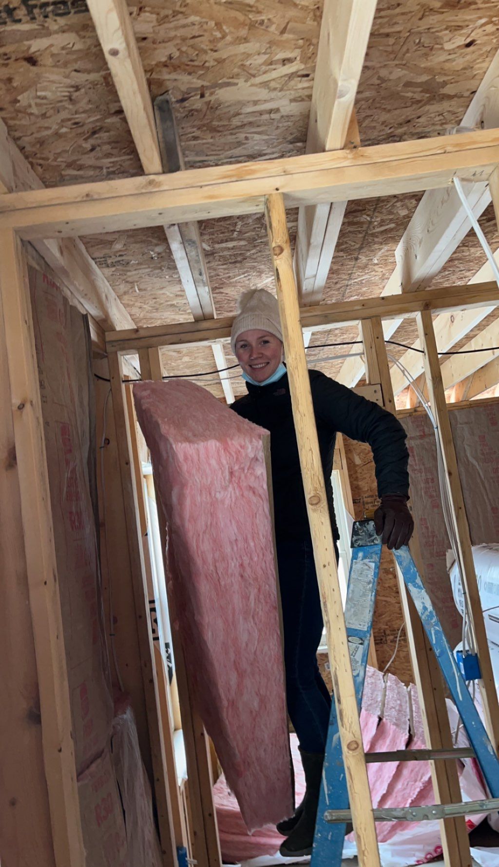 Ali putting up insulation