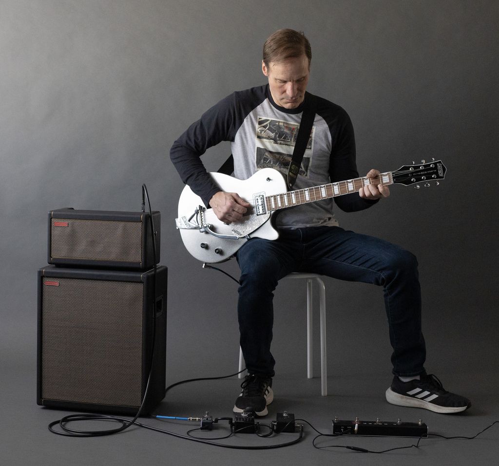 Studio shot with my custom silver Gretsch guitar.