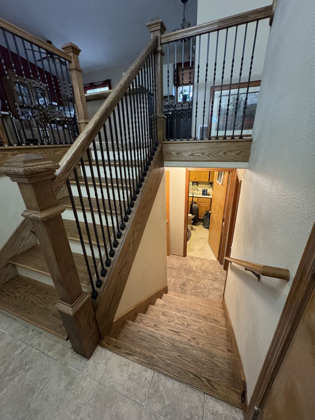 Brand new oak and wrough iron railings. The stairs