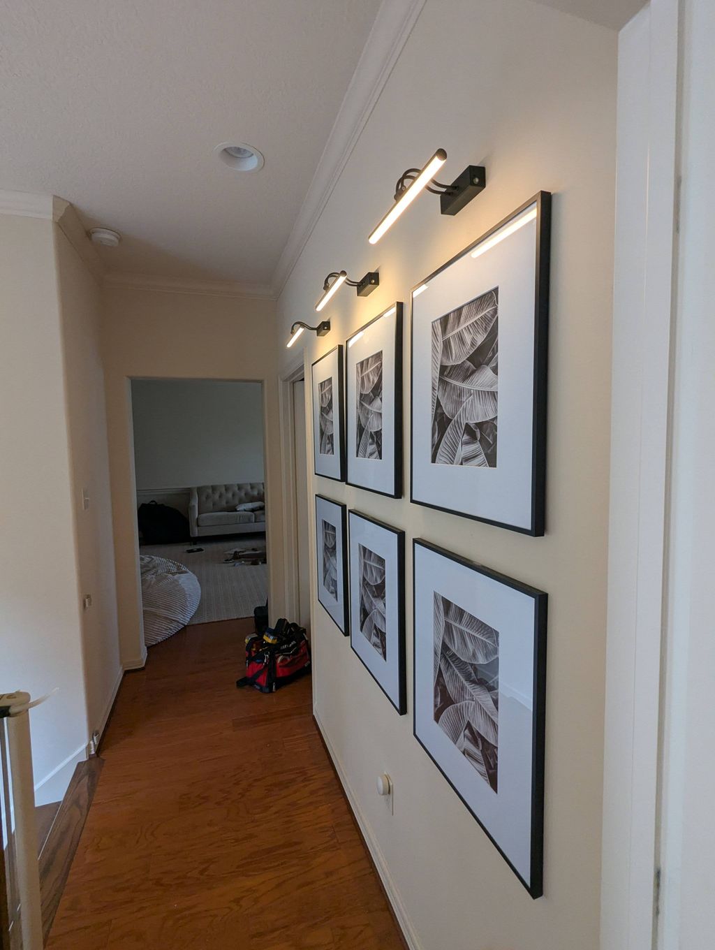 Mount the pictures and lights above 