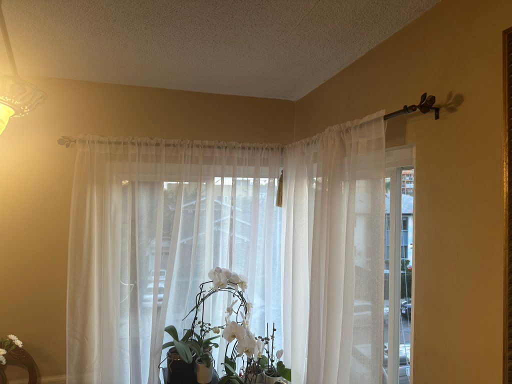 I hung the curtain rods and curtains.