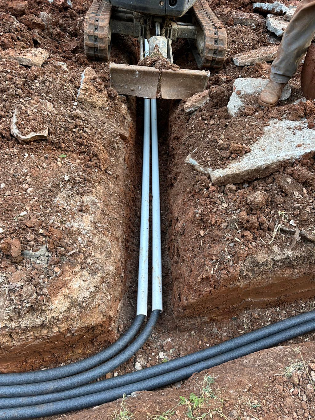 Running water lines through a parking lot! 