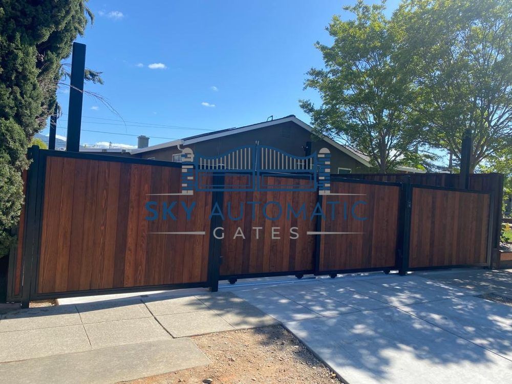 New sliding automatic gate with a sleek wood panel