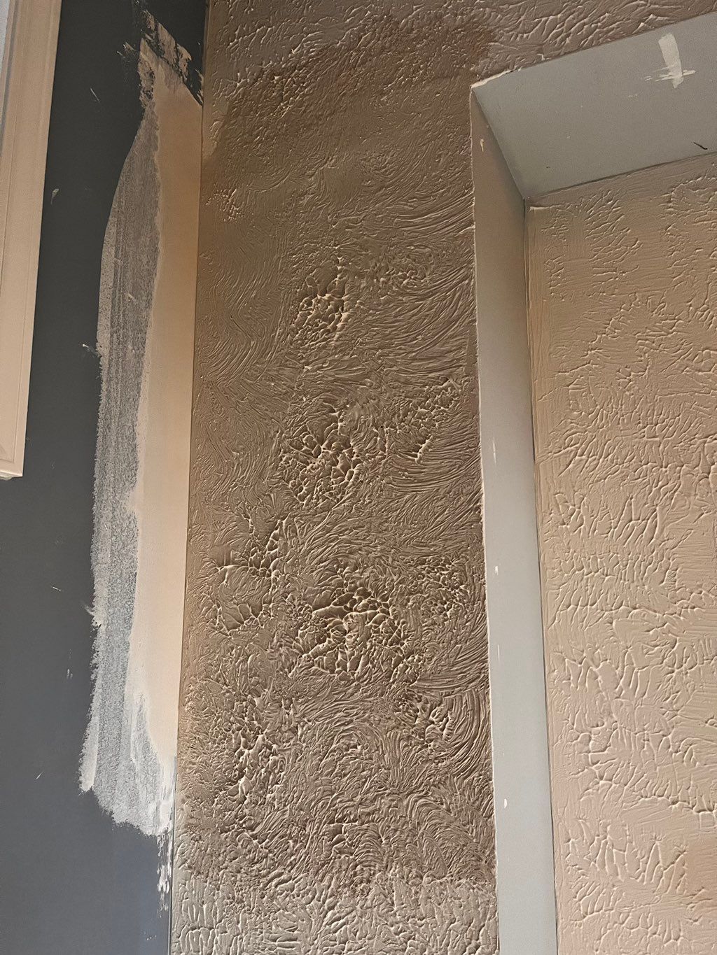 A textured ceiling repair. Good as new! 