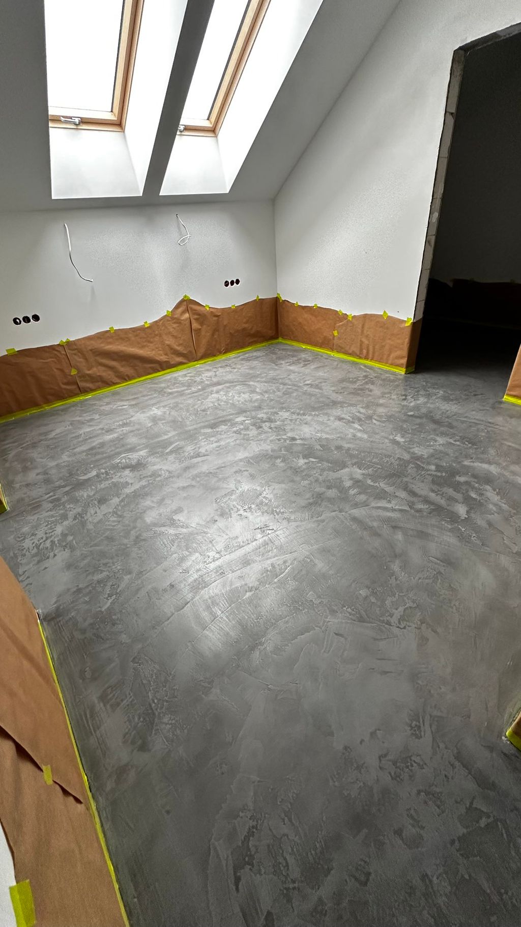 this stone-style microcement floor took two weeks 