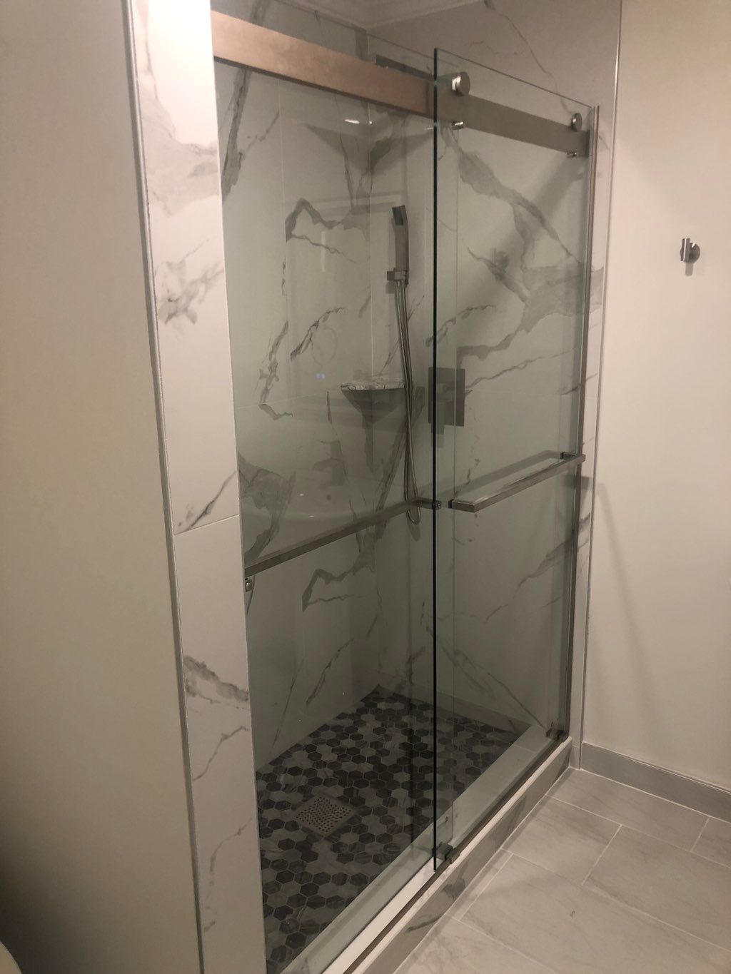 Mike installed 2 sliding shower glass doors at my 