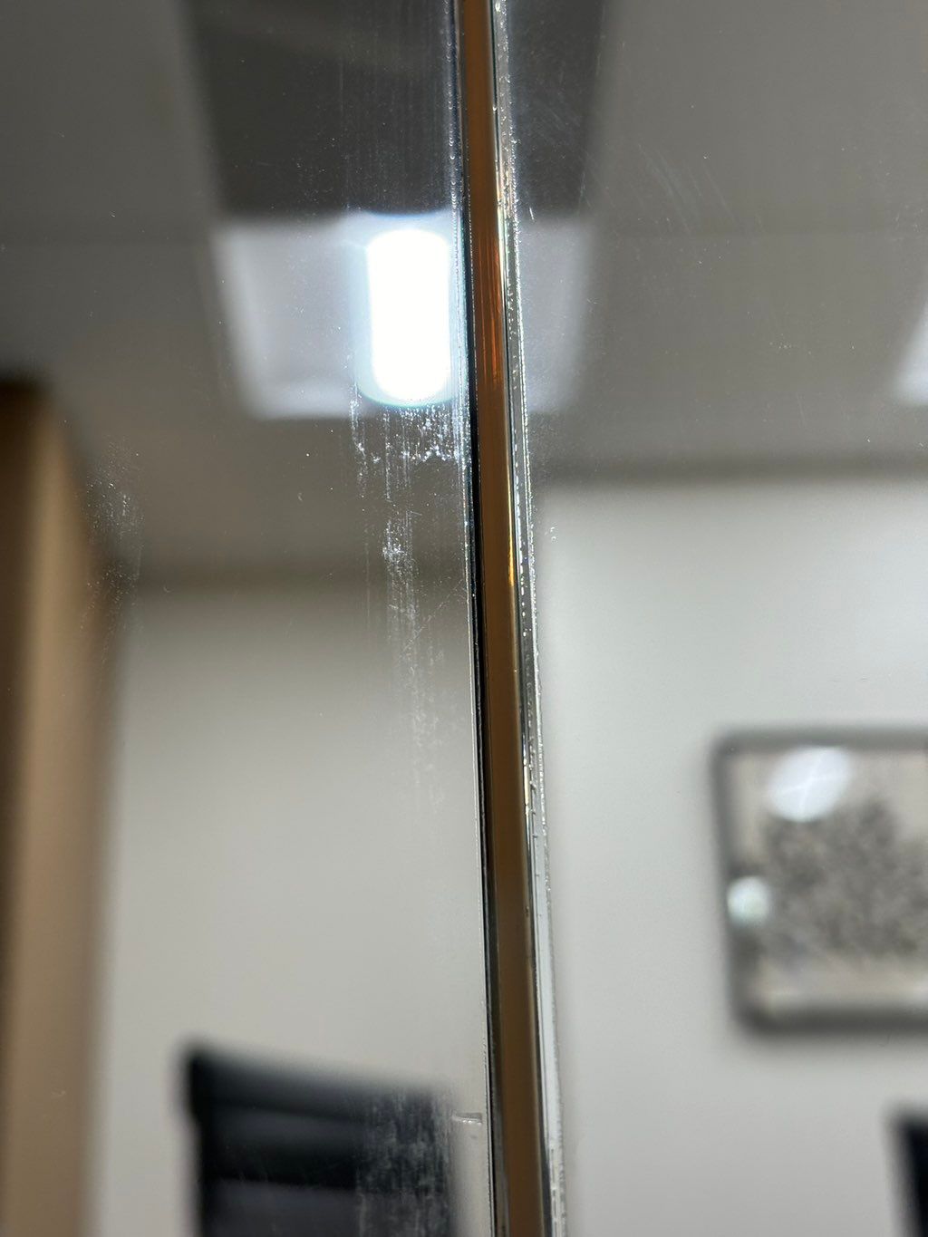 Clear Silicone applied in between glass pane joint