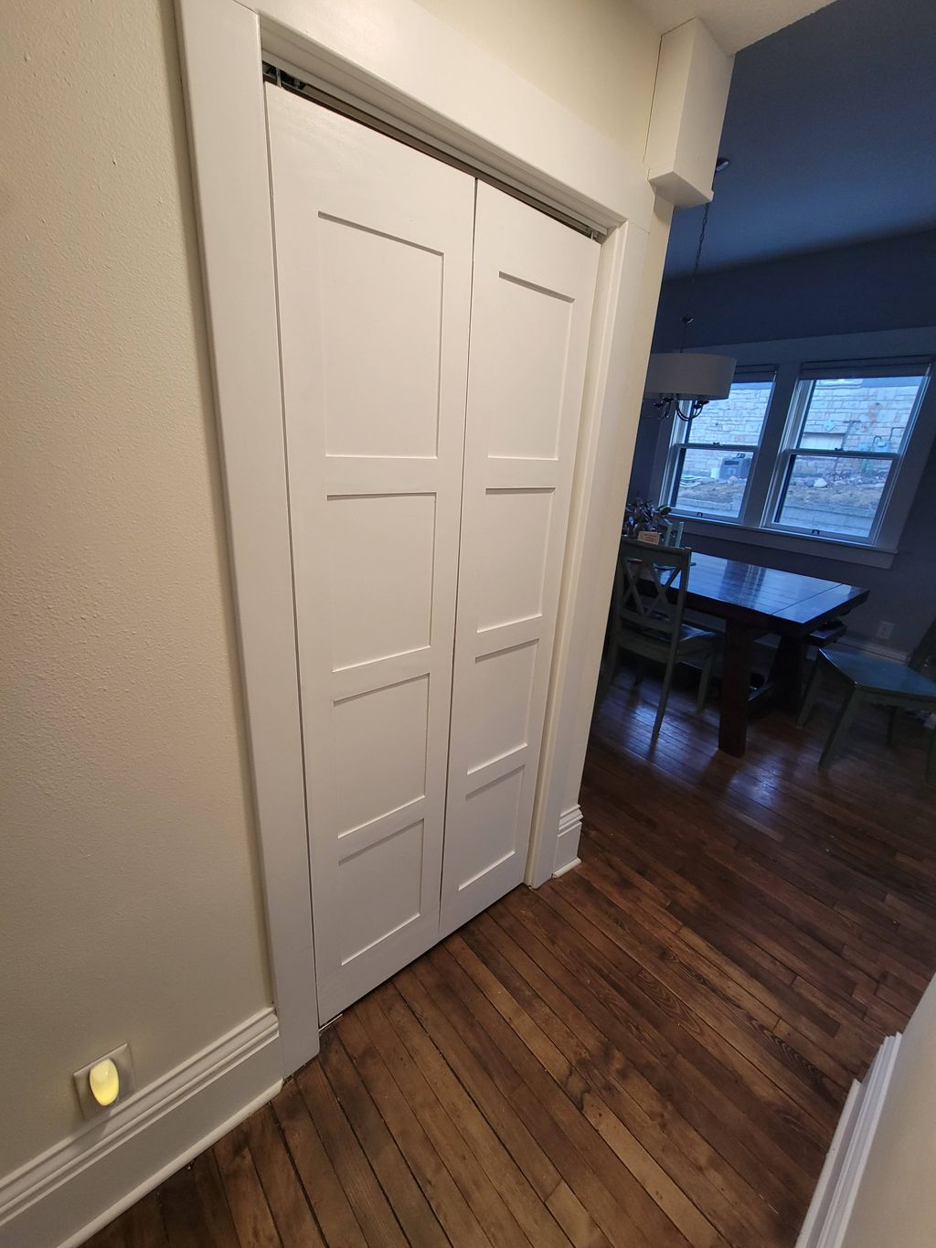 Custom bifold doors installed on the under-stair p