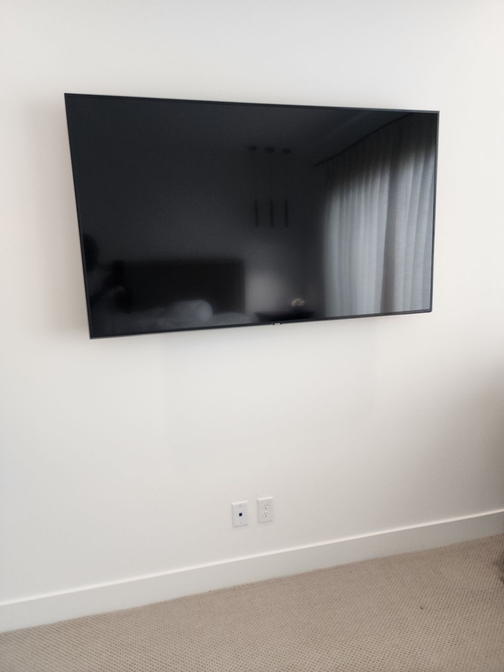 Flatscreen wall mount and raised outlet install