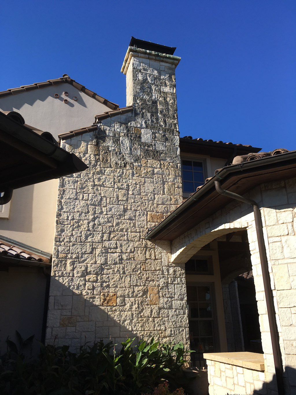 The entire chimney was black with stains.   We cle
