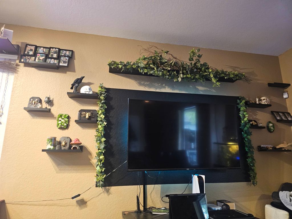 Built and designed floating shelves. mounted TV an