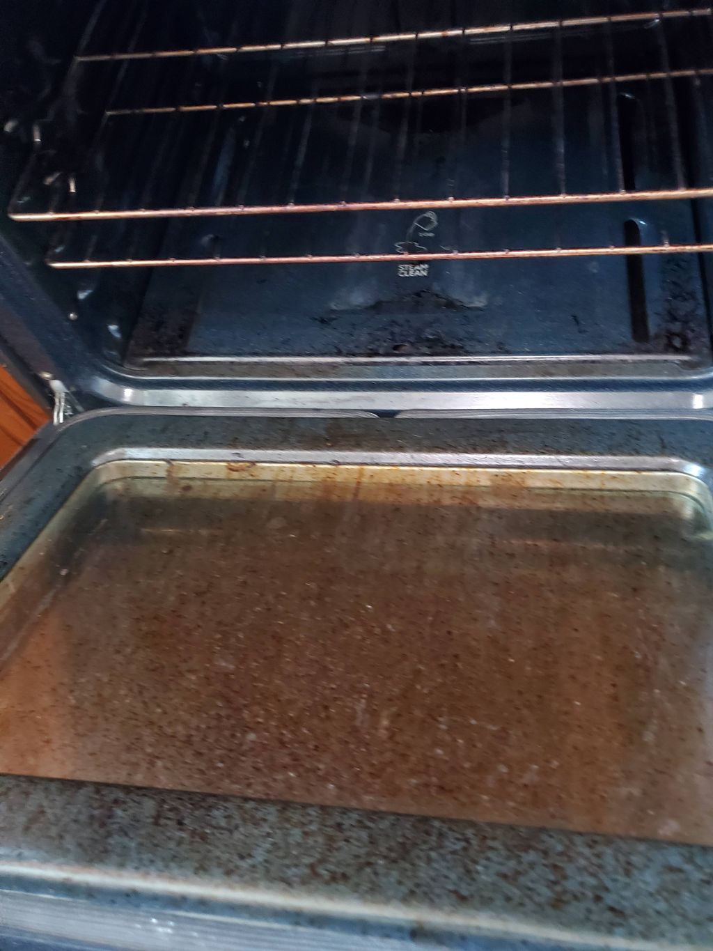 Before cleaning grease off oven window