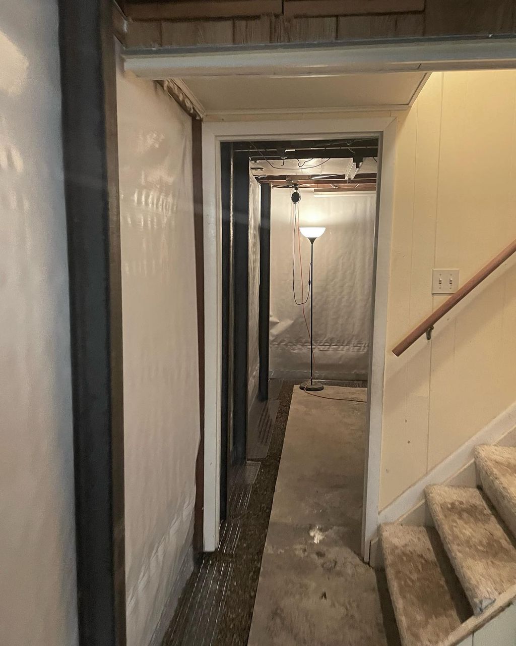 Steel I-Beam, Vapor Barrier and Interior Drain Til